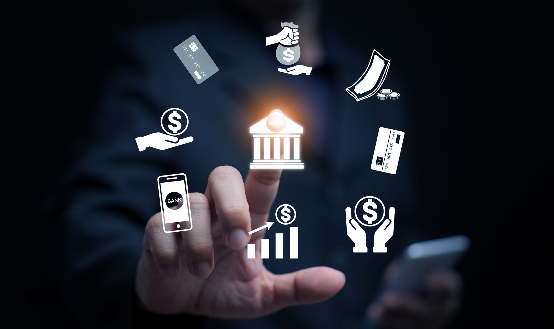 Businessman using digital banking technology with finance icons, mobile payment, credit card, online transaction, and money management in modern financial services.